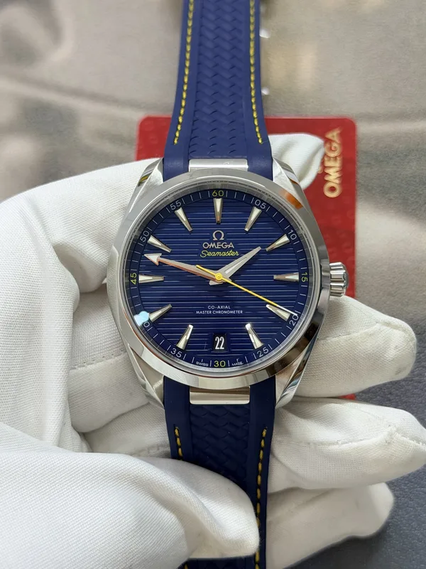 VSF Aqua Terra 41 mm, blue teak-pattern dial, yellow seconds hand, blue rubber strap, front view