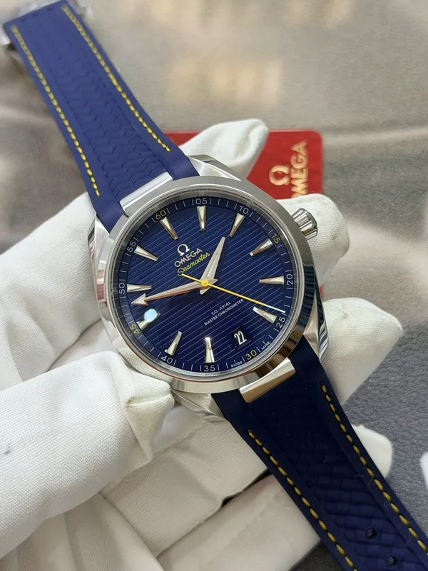VSF Aqua Terra 41 mm, blue teak-pattern dial, yellow seconds hand, blue rubber strap, angled view