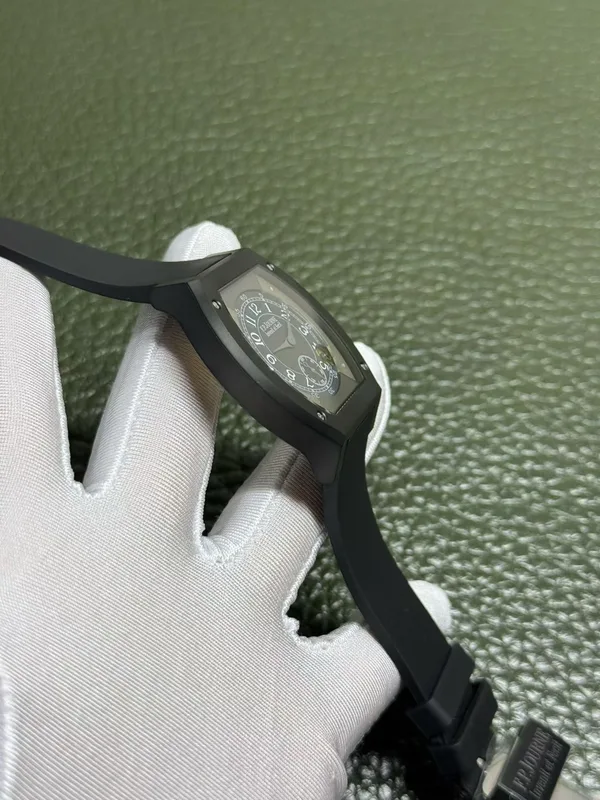 Élégante 48 mm replica, black rubber strap, black case