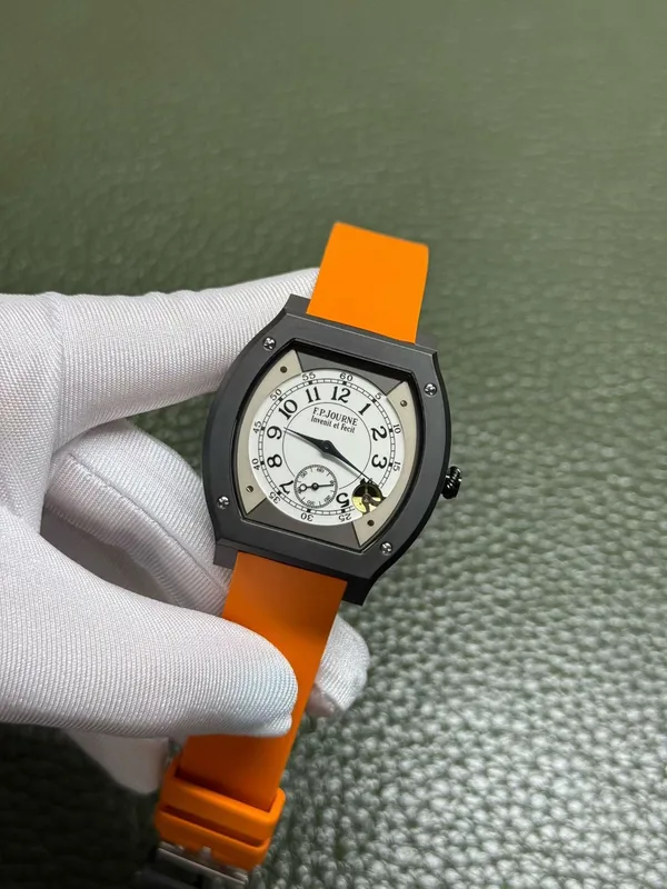 Élégante 48 mm replica, white dial, black case, orange rubber strap