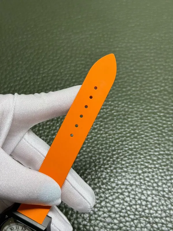 Élégante 48 mm replica, white dial, black case, orange rubber strap