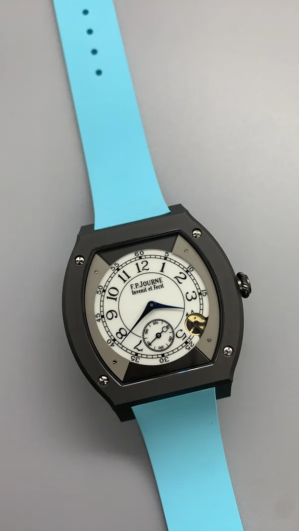 Élégante 48 mm replica, white dial, dark case, sky blue rubber strap