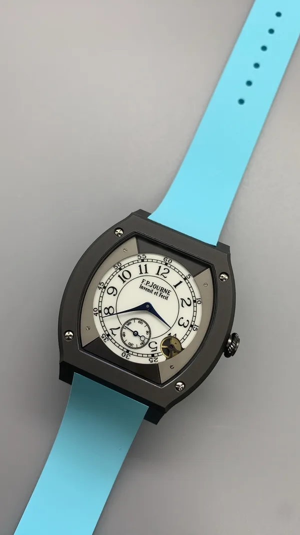 Élégante 48 mm replica, white dial, dark case, sky blue rubber strap