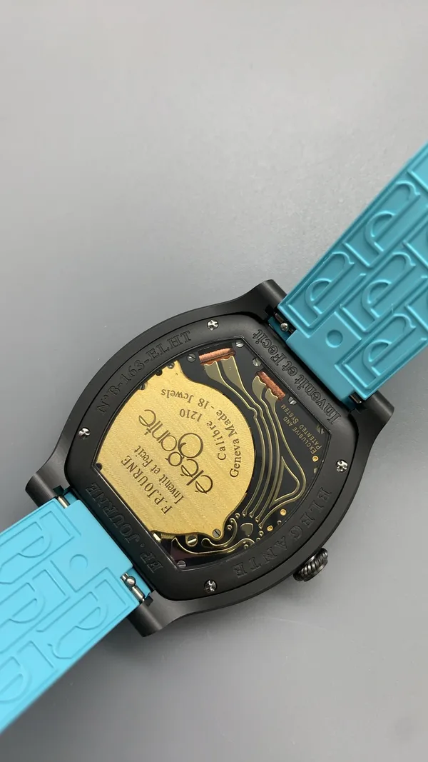 Élégante 48 mm replica, white dial, dark case, sky blue rubber strap