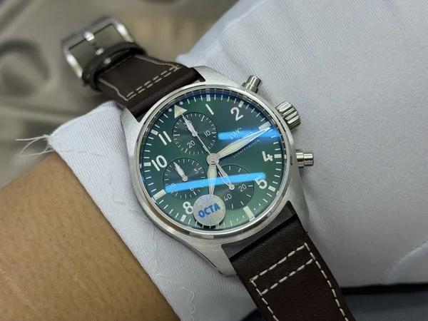 OCTA Pilot's Chronograph, green dial, brown leather strap, on the wrist