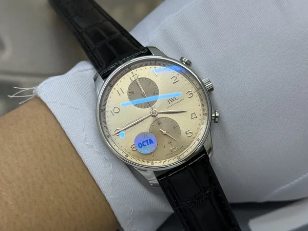 OCTA Portugieser Chronograph, dune dial, black leather strap, on the wrist