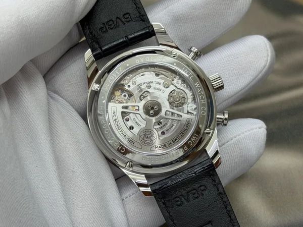 OCTA Portugieser Chronograph, silver dial with blue hands, black leather strap, display caseback and movement